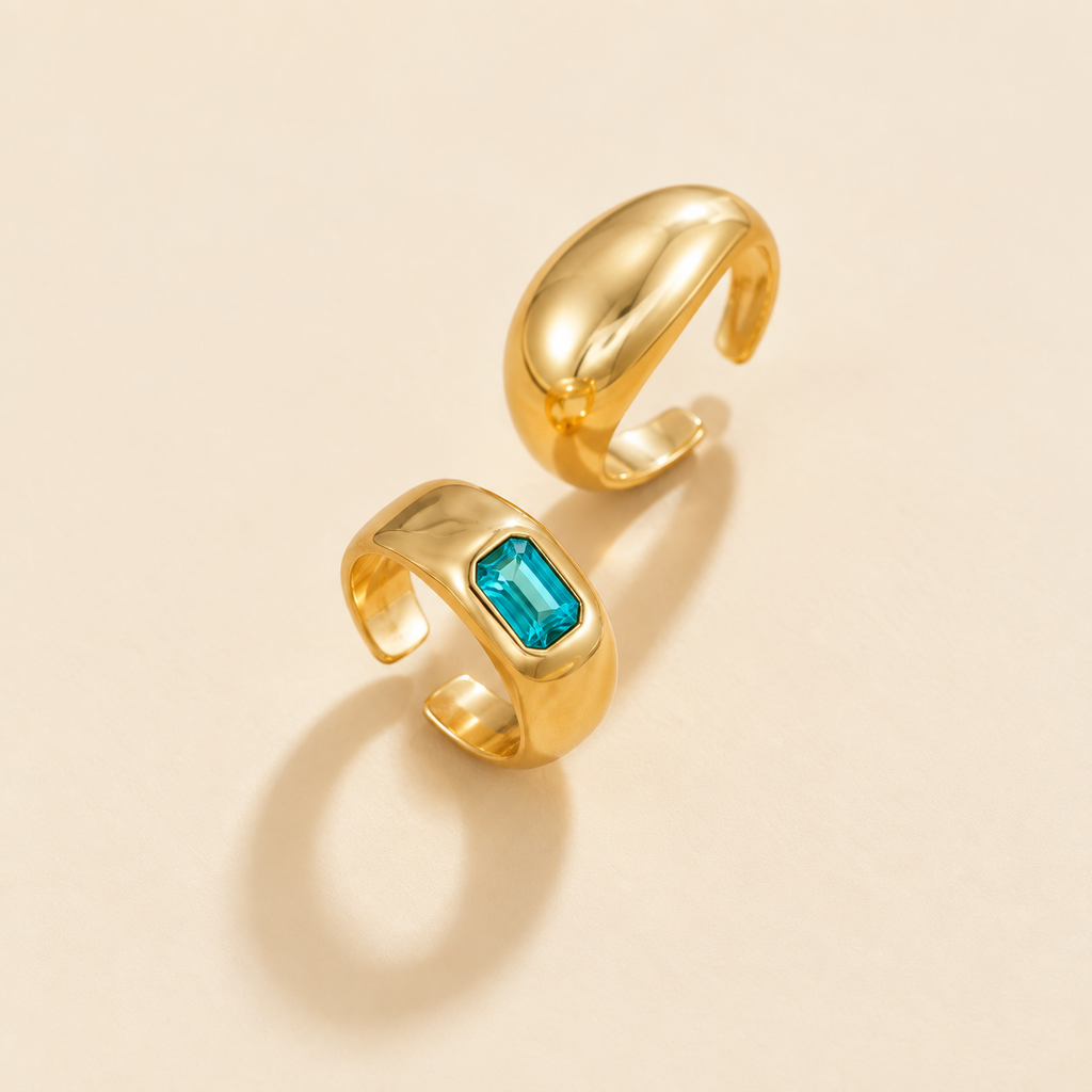 Azure Duo gold-tone open toe rings with blue stone