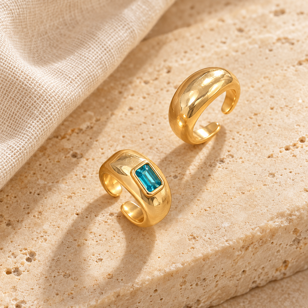 Azure Duo toe rings on travertine